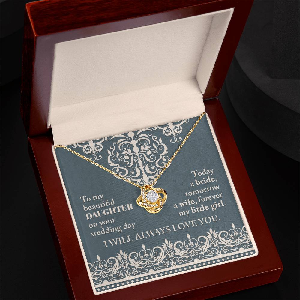 A To My Daughter Wedding, Always Love You - Love Knot Necklace with an intertwined pendant adorned with cubic zirconia crystals on a decorative card. The card reads: "To my beautiful daughter on your wedding day. Today a bride, tomorrow a wife, forever my little girl. I will always love you.