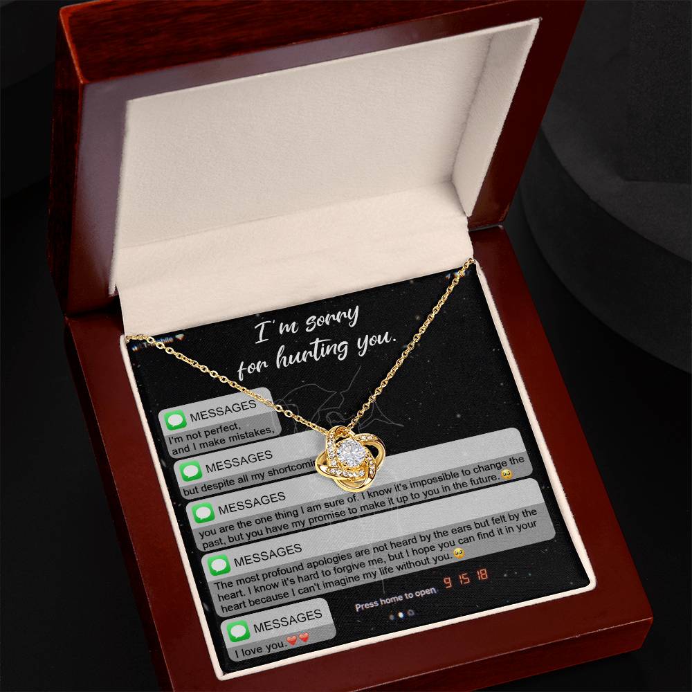 Presenting the "Sorry, Life Without You - Love Knot Necklace," a heartfelt card featuring an emotional message of apology along with a delicate necklace. The love knot design combines intertwined hearts and knots adorned with sparkling cubic zirconia crystals, concluding with the words "I love you." This personalized gift beautifully conveys your genuine emotions.