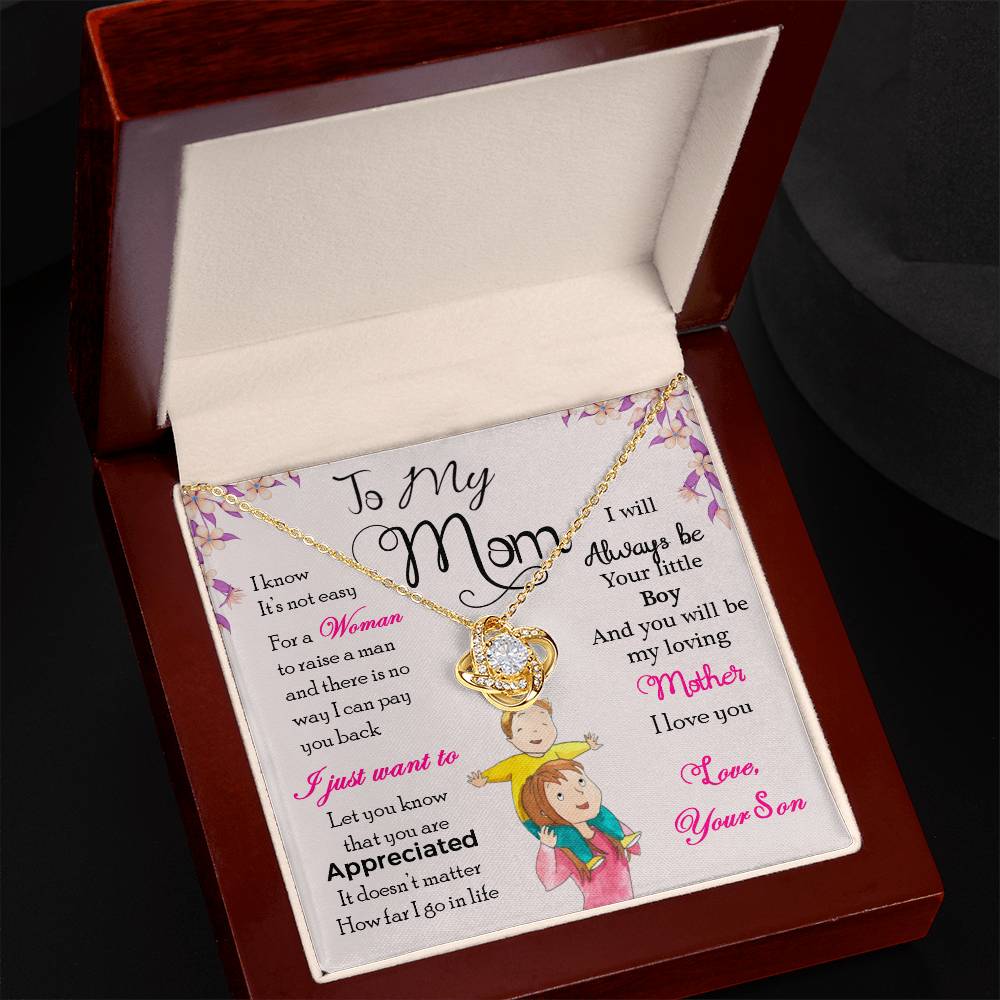 A To My Mom, I Will Always Be Your Little Boy - Love Knot Necklace with a heart-shaped pendant in a gold finish, featuring a sentimental message for a mother from a son by ShineOn Fulfillment.