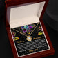 The Sorry-All My Heart - Love Knot Necklace features an interlocking heart pendant on a card with vibrant succulent graphics and the message: "I'm Sorry, Please forgive me. I love you." Adorned with sparkling cubic zirconia crystals, this necklace is available in a choice of white gold or yellow gold finish.