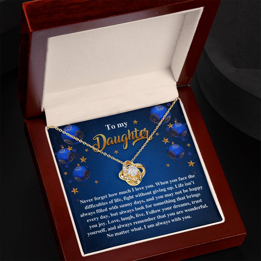 The Daughter-Sunny Days - Love Knot Necklace featuring cubic zirconia crystals is elegantly displayed in an open box with a card that reads "To my Daughter." The heartfelt message is beautifully surrounded by stars on a blue background, making it the perfect personalized gift.