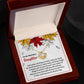 A Daughter-Fill Your Life - Love Knot Necklace in a gift box with a heartfelt message for your daughter. The note highlights faith, hope, and love, complemented by cubic zirconia crystals and an illustration of autumn leaves.