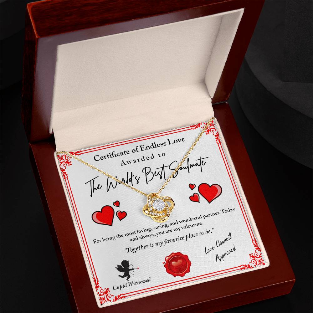 The Love Certificate-Cupid Witnessed Love Knot Necklace, adorned with sparkling cubic zirconia, comes in a box with a certificate reading "World's Best Soulmate" and decorative hearts, making it the perfect classic gift.