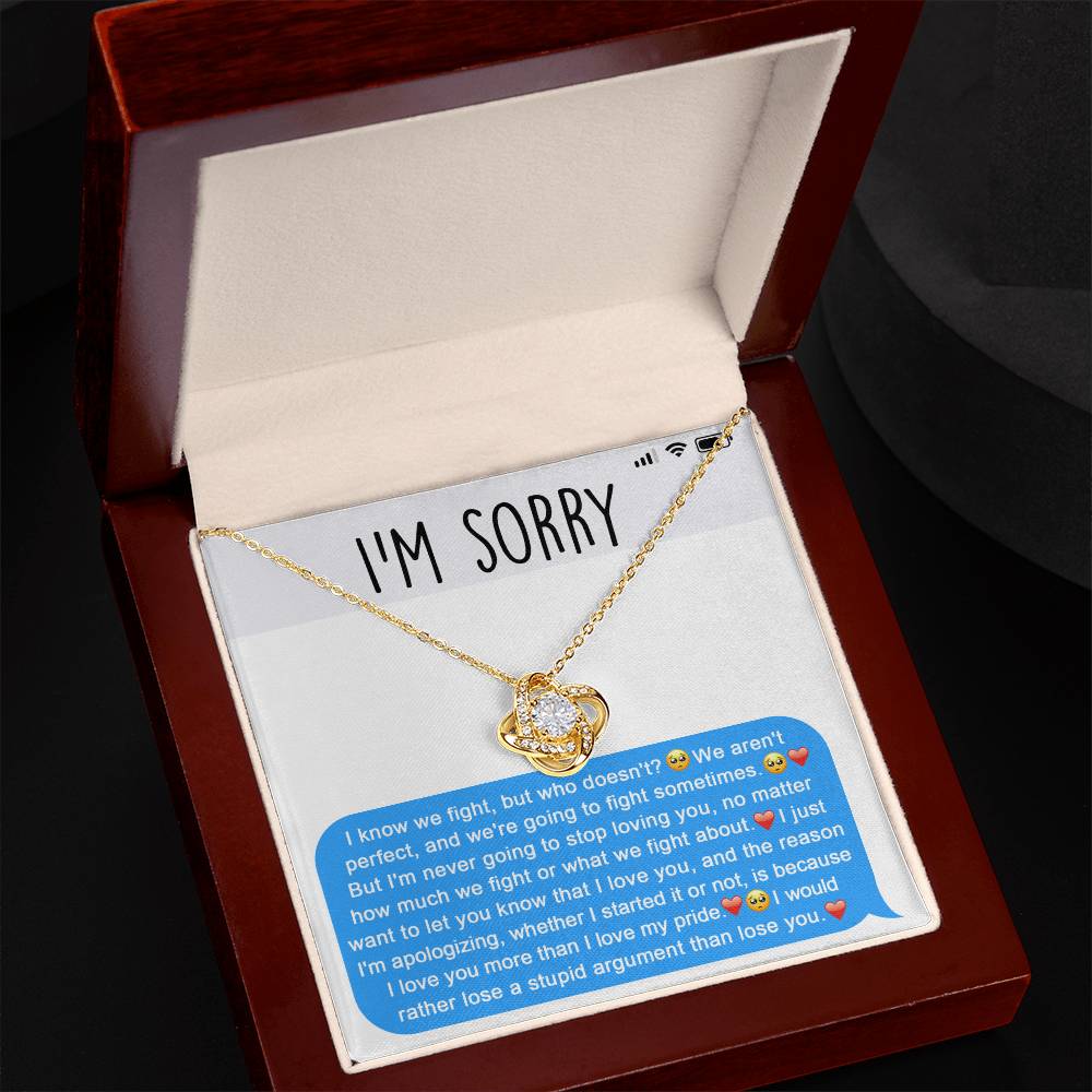 The Sorry-Stupid Argument - Love Knot Necklace, embellished with sparkling cubic zirconia crystals, is displayed above a heartfelt apology message. The message conveys love, regret over their argument, and a genuine desire to prioritize the relationship, making this personalized gift truly meaningful.