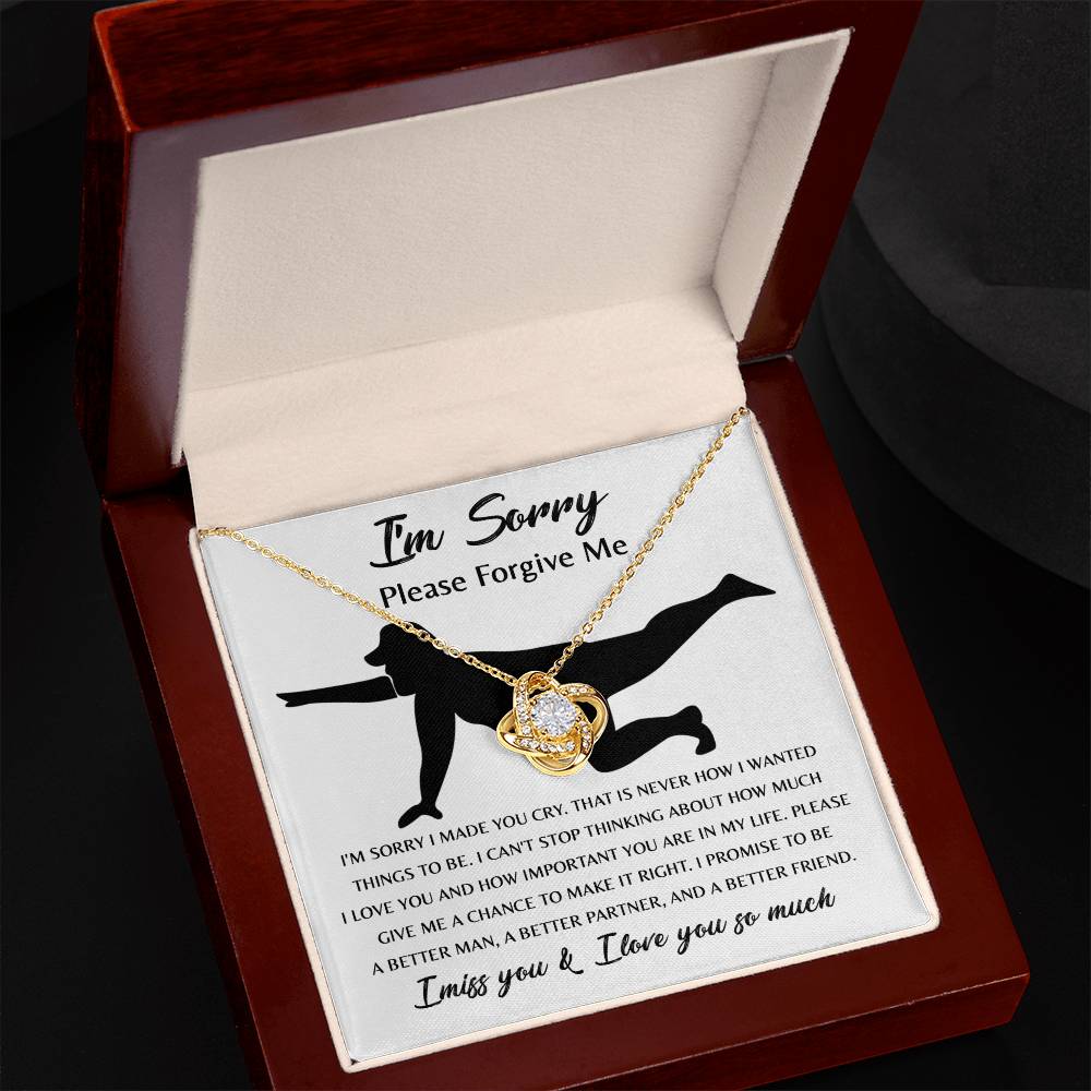 The Sorry-Things to Be Love Knot Necklace features an intertwined knot pendant adorned with cubic zirconia crystals and comes with a heartfelt card that depicts a silhouette of a person kneeling and the words, "I'm sorry, please forgive me... I promise to be a better man..." among other touching text. This classic gift speaks volumes.