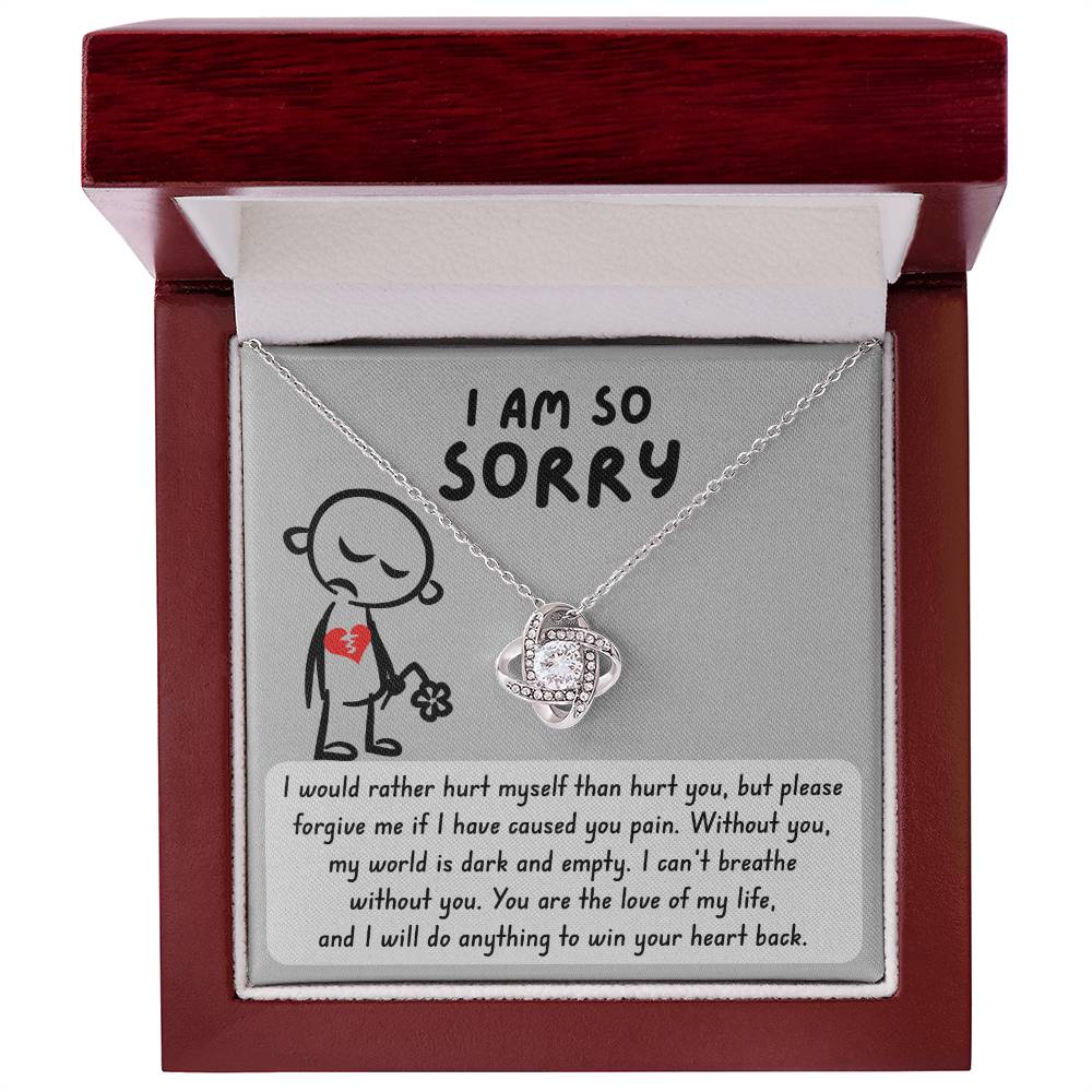 The Sorry-Dark And Empty - Love Knot Necklace comes in a red box, adorned with premium cubic zirconia crystals, and is accompanied by a heartfelt message: "I am so sorry. Without you, my world is dark and empty. I can't breathe without you. You are the love of my life, and I will do anything to win your heart back.