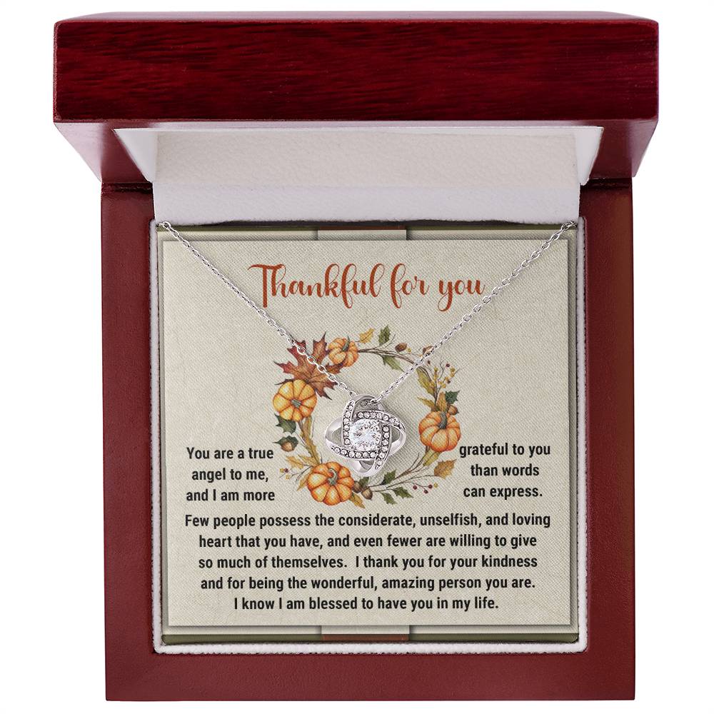 The Thanksgiving-The Wonderful - Love Knot Necklace is a personalized gift that features a silver heart pendant adorned with cubic zirconia crystals, beautifully presented inside a box. The lid is inscribed with "Thankful for you," accompanied by a heartfelt message below.