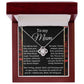 The Mom-By My Side - Love Knot Necklace, featuring a heart-shaped pendant in silver, comes in a red jewelry box with a rose-bordered card that reads "To my Mum" and conveys gratitude—making it an ideal gift for a loved one.