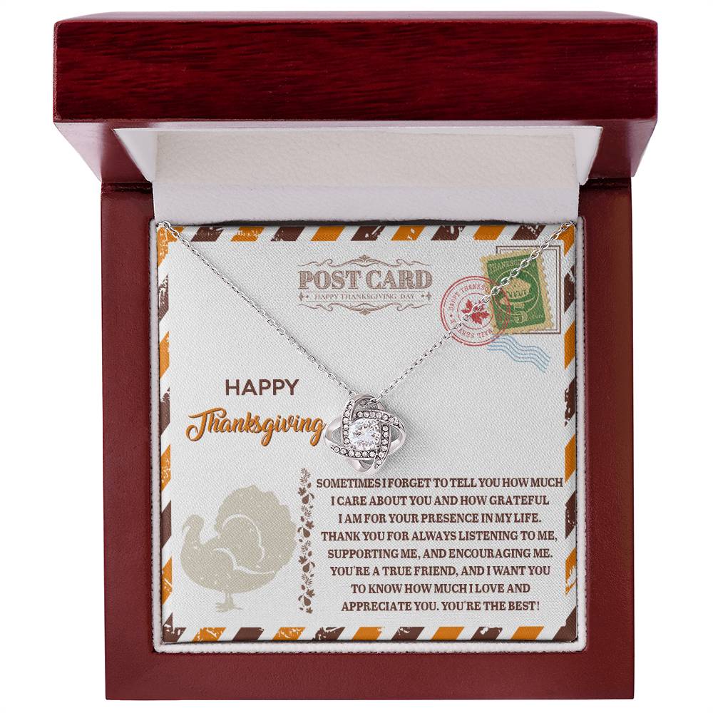 The Thanksgiving-A True Friend - Love Knot Necklace, adorned with cubic zirconia crystals and featuring a heart-shaped pendant, is beautifully presented in a wooden box. It includes a Thanksgiving-themed message that celebrates the unbreakable bond.