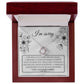 A "Sorry-Made A Mistake - Love Knot Necklace" features a box with a heartfelt apology message. The white gold finish and cubic zirconia crystals shimmer, as the text expresses deep regret and sorrow for causing hurt, describing the actions as pathetic, cowardly, and selfish, pleading for forgiveness.