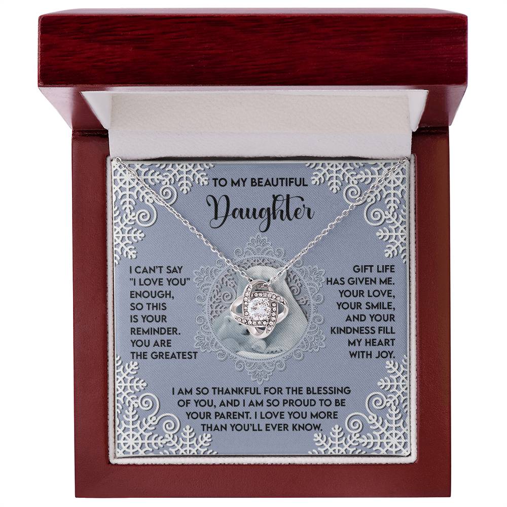 The Daughter-Fill My Heart - Love Knot Necklace comes in a gift box with a heartfelt message for daughters, featuring a decorative border and embellished with cubic zirconia.