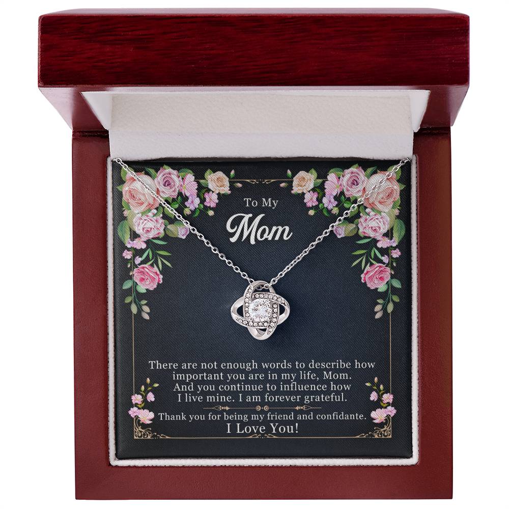 A "To My Mom, Thank yOU For Being My Friend" Love Knot Necklace in a gift box with a sentimental message for mom by ShineOn Fulfillment.