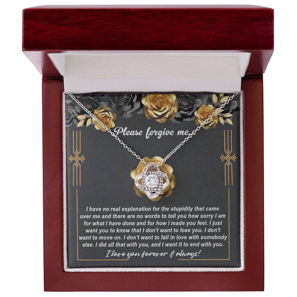 The "Sorry-End With You - Love Knot Necklace" features a beautiful heart-shaped pendant adorned with cubic zirconia crystals, making it a perfect apology gift. The necklace, with its elegant yellow gold finish, is accompanied by a background message expressing deep remorse and a heartfelt desire to stay together.