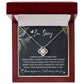 The Sorry-The Best Thing - Love Knot Necklace, featuring a planet-shaped pendant and adorned with premium cubic zirconia, is beautifully displayed in a red box. Accompanied by a card that reads "I'm Sorry" and includes an apology message expressing love and regret, this personalized gift elegantly conveys heartfelt emotions.