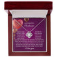 Inside the jewelry box is the stunning Soulmate-My Soul - Love Knot Necklace, elegantly enhanced with cubic zirconia crystals. In the background, a purple card displays a heartfelt romantic message to a soulmate.