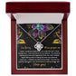 The Sorry-All My Heart - Love Knot Necklace features an interlocking heart pendant on a card with vibrant succulent graphics and the message: "I'm Sorry, Please forgive me. I love you." Adorned with sparkling cubic zirconia crystals, this necklace is available in a choice of white gold or yellow gold finish.