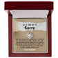The Sorry-Keep Me Apart - Love Knot Necklace, featuring an interlocking circle pendant encrusted with cubic zirconia crystals, is elegantly presented in a wooden box. Inside, an apology note expresses heartfelt remorse and a promise to improve, while the cover poignantly reads "All I can say is sorry," making it a truly personalized gift.