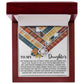 The "Daughter-The Same Things - Love Knot Necklace" jewelry box features a heartfelt message to a daughter, surrounded by a vibrant plaid pattern. Inside, it presents a stunning Love Knot Necklace adorned with cubic zirconia crystals, available in both white gold and yellow gold finishes.