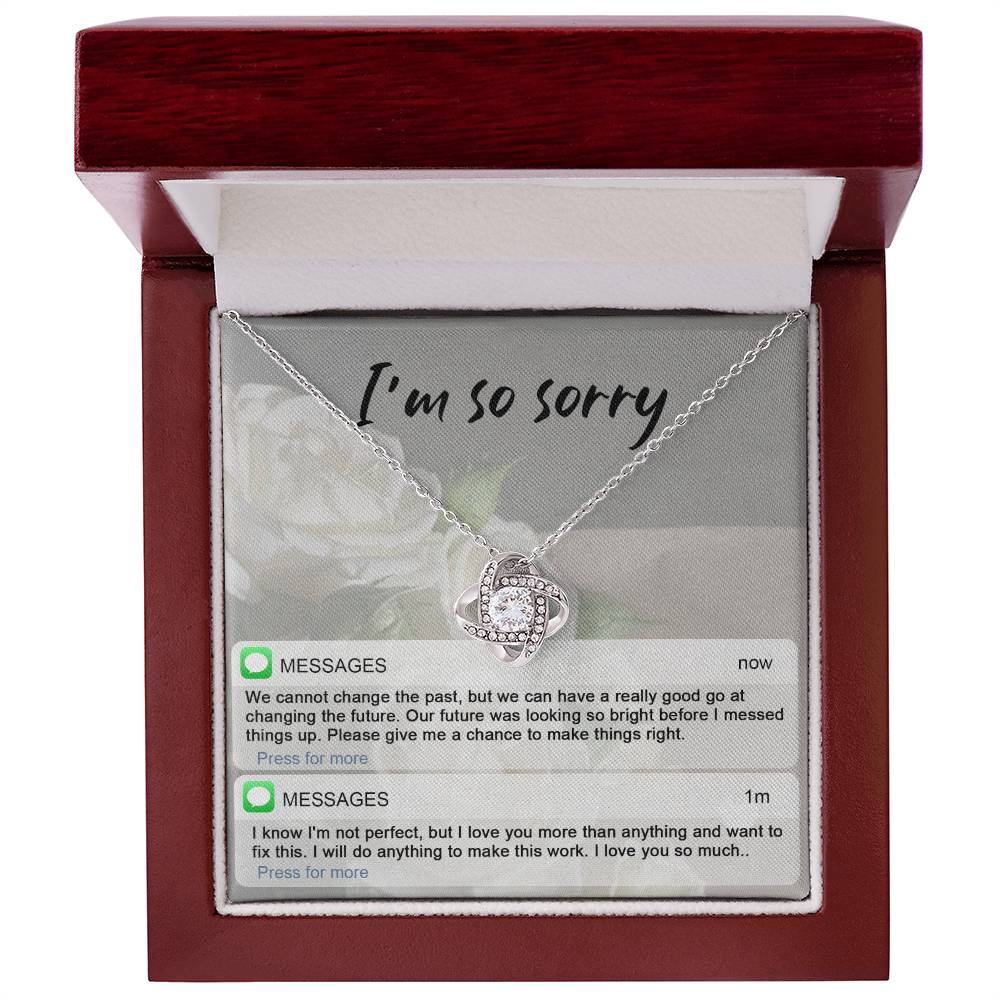 A stunning Sorry-I_m Not Perfect - Love Knot Necklace with cubic zirconia crystals is displayed on an "I'm so sorry" card. Below are text messages expressing regret and love, asking for a chance to make things right.