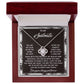 Presented in a wooden box, the Soulmate-Deeply And Purely Love Knot Necklace features 14k white gold and cubic zirconia crystals. The lid is inscribed with a love and appreciation message for your soulmate.
