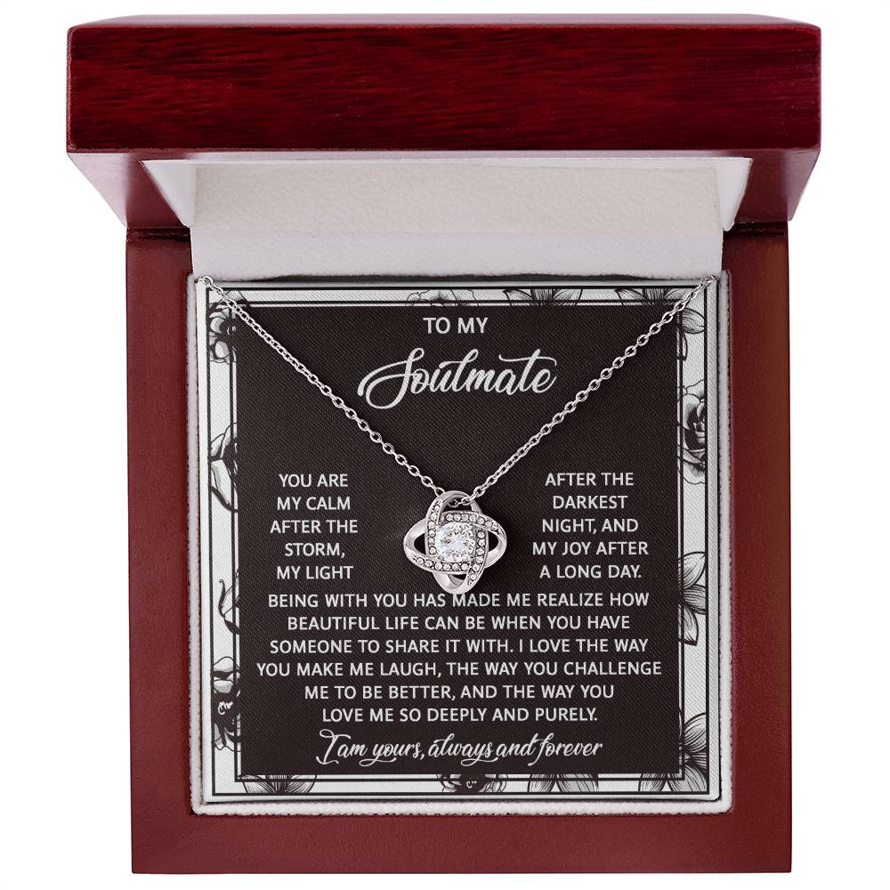 Presented in a wooden box, the Soulmate-Deeply And Purely Love Knot Necklace features 14k white gold and cubic zirconia crystals. The lid is inscribed with a love and appreciation message for your soulmate.