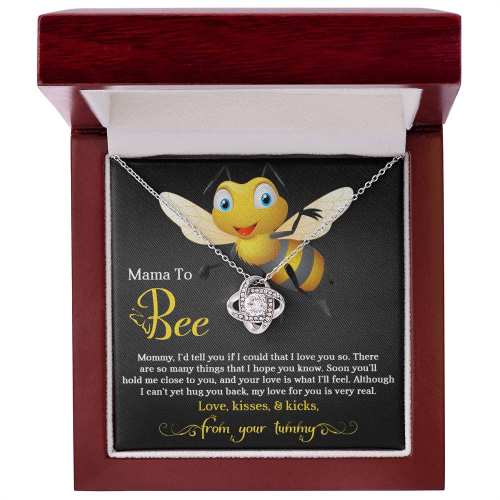 Sentence with replaced product:
A To Mom To Be, Hope You Know - Love Knot Necklace with a bee design and a heart-shaped cubic zirconia crystal, presented in a gift box with a sentimental message for an expectant mother from the unborn baby. (Brand Name: ShineOn Fulfillment)