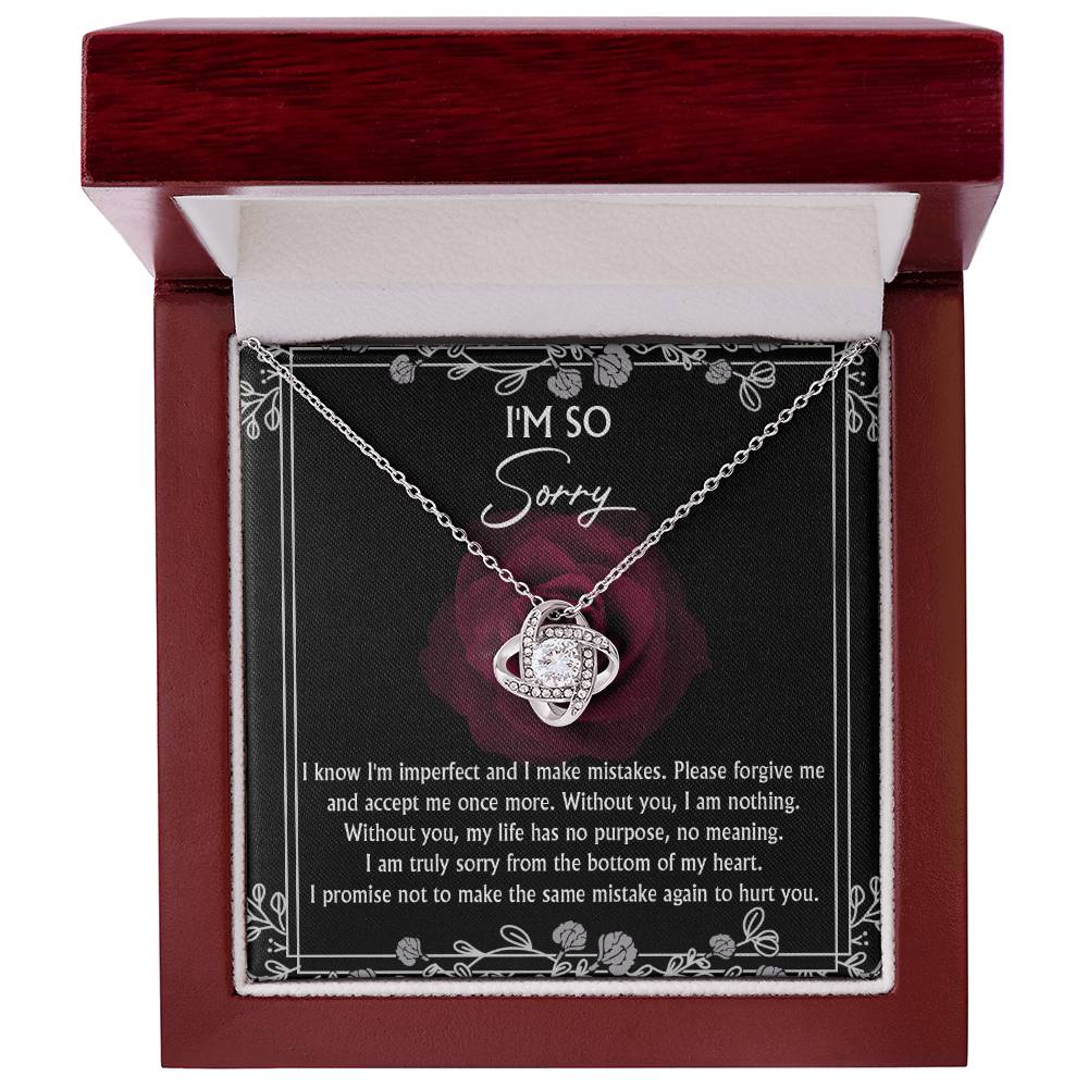 The "Sorry-I Am Nothing - Love Knot Necklace," featuring a gold finish, comes beautifully presented in a wooden box inscribed with "I’M SO Sorry" and is accompanied by an apologetic message expressing deep regret and seeking forgiveness.