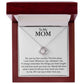 A To My Mom, You Are My First Country - Love Knot Necklace adorned with cubic zirconia crystals, presented in a box with a message for a mother inside the lid.