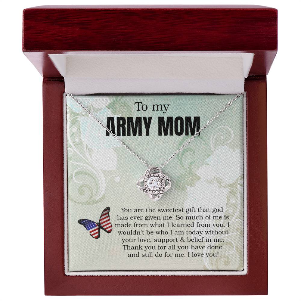 The "To My Army Mom, You Are The Sweetest Gift That God Has Ever Given Me" Love Knot Necklace is presented in a jewelry box with a message for an "army mom," expressing appreciation and love, featuring premium cubic zirconia crystals by ShineOn Fulfillment.