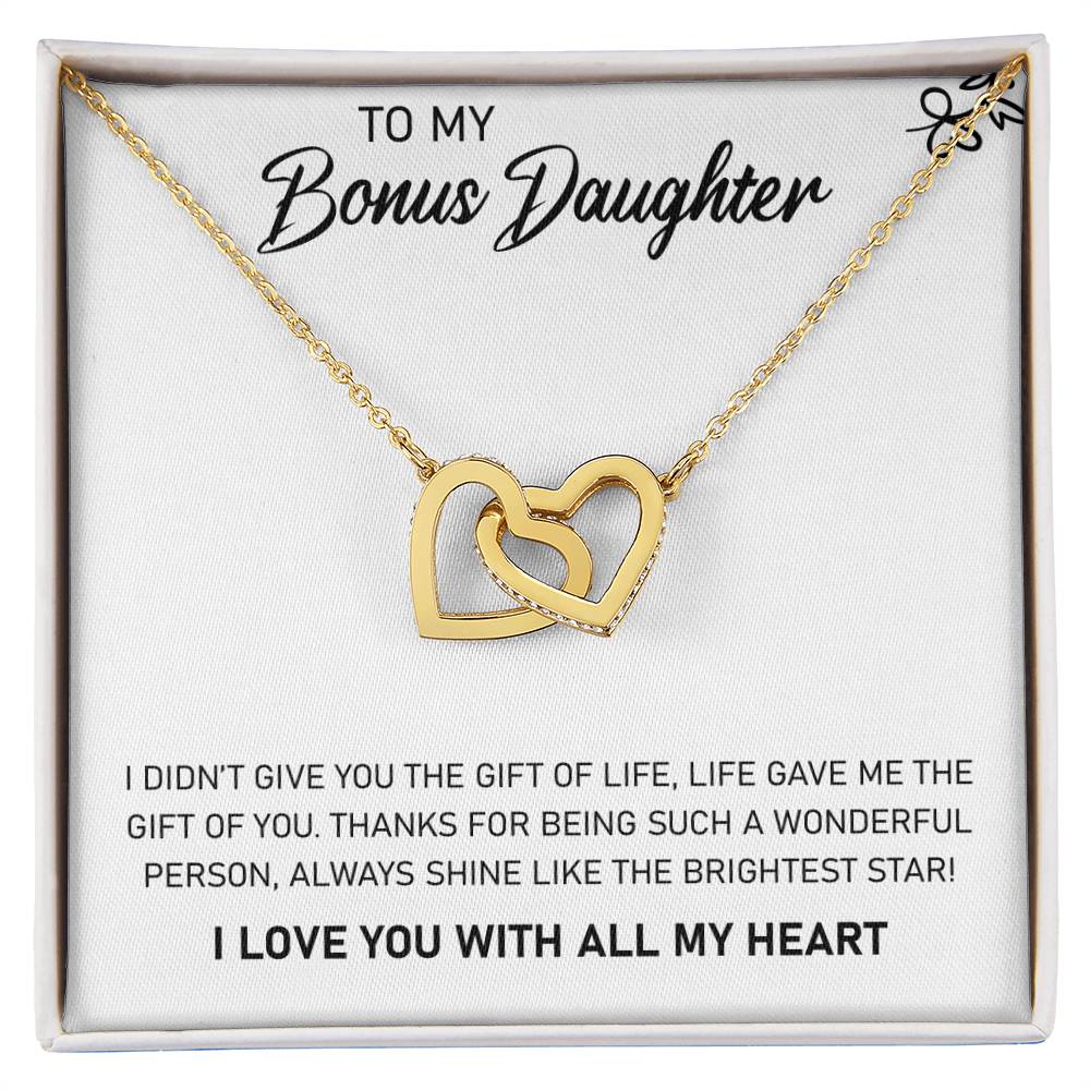 Gold To My Bonus Daughter, Always Shine Like The Brightest Star Interlocking Hearts Necklace presented in a gift box by ShineOn Fulfillment.