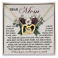 The Mom-Guardian Angel set includes an Interlocking Hearts necklace with cubic zirconia crystals and a decorative card featuring floral accents. The rose gold finish and heartfelt message express gratitude and love for "Mom" and her unwavering support.