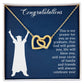 ShineOn Fulfillment's Prayer For Graduation - Interlocking Hearts Necklace, featuring cubic zirconia crystals and "congratulations" text on the gift box.