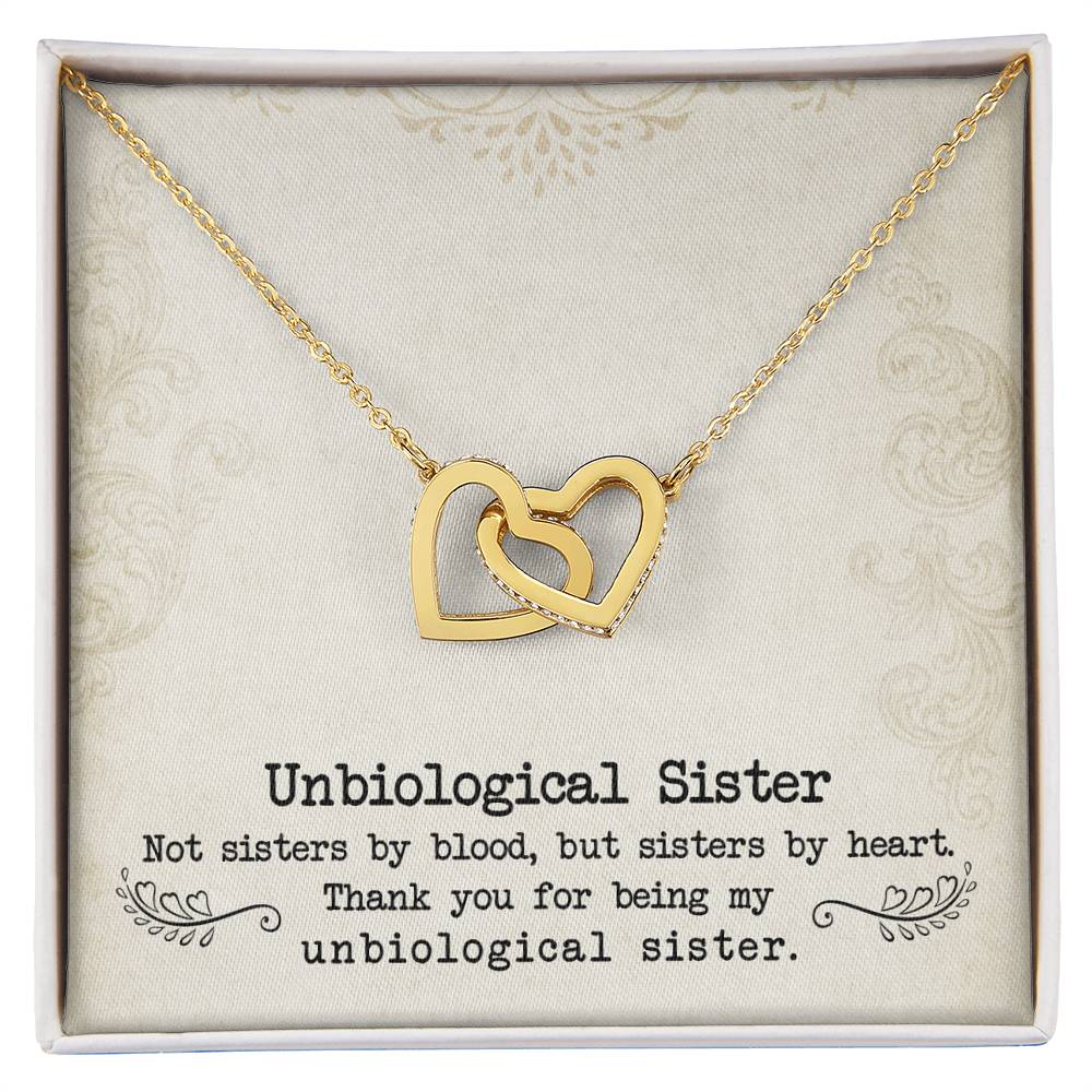 ShineOn Fulfillment's "To My Unbiological Sister, Sister By Heart - Interlocking Hearts Necklace" with an inscription expressing affection for a chosen sister-like relationship, presented in a gift box.