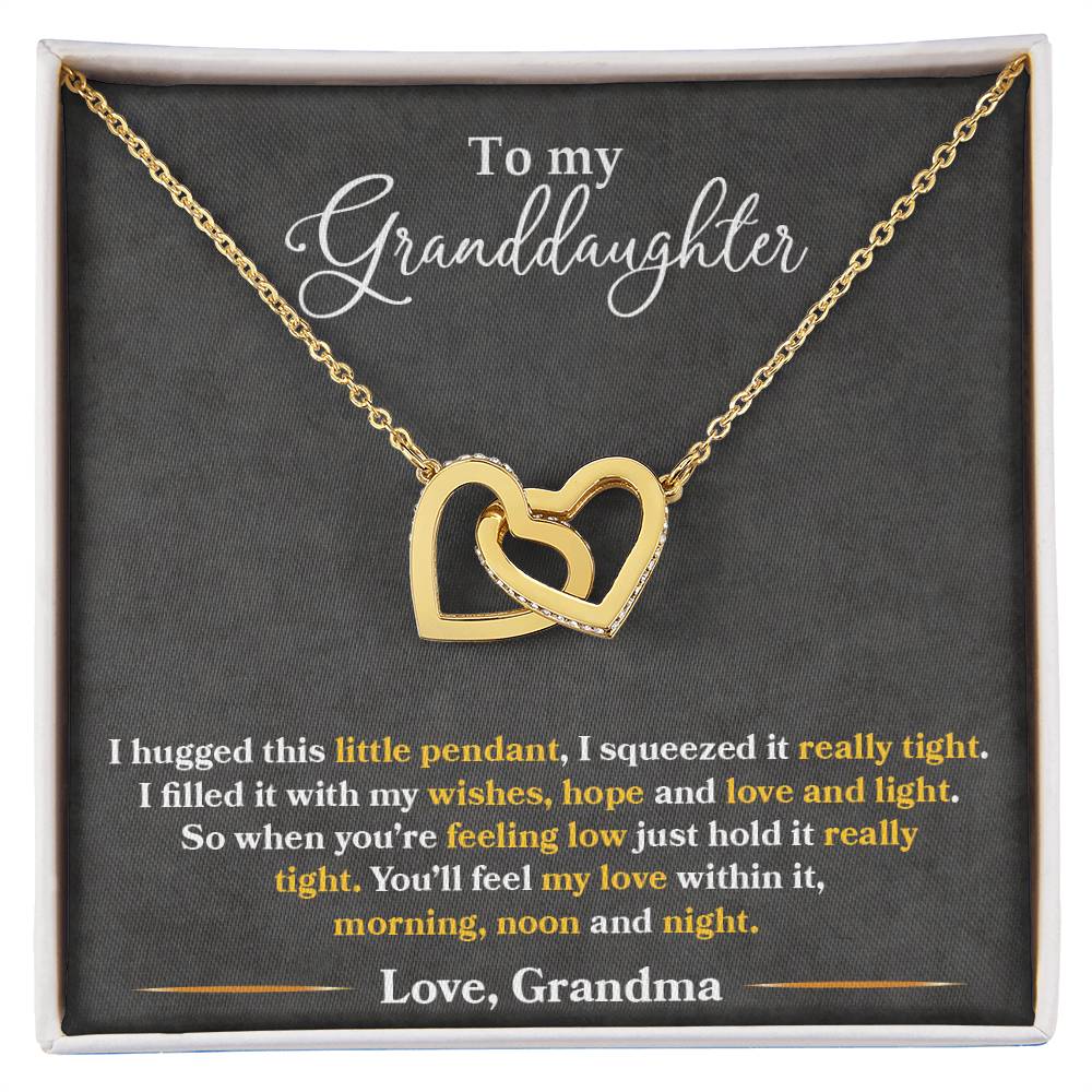 A To My Granddaughter, You_ll Feel My Love Within This - Interlocking Hearts Necklace featuring cubic zirconia crystals, displayed in a gift box with a sentimental message from ShineOn Fulfillment to her granddaughter.