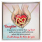 A high quality polished surgical steel necklace with two interlocking hearts is placed over an illustration of hands holding a red heart. Text reads: "Daughter, I want you to know that my heart walks with you and holds you when my arms cannot. I will always be there for you.
Product Name: To Daughter, Always Be There - Interlocking Hearts Necklace.