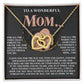 The Mom-More To Me 2 gift box features an Interlocking Hearts Necklace decorated with cubic zirconia crystals and a stunning 18k yellow gold finish, set against a heartfelt message of love and gratitude for a mother.