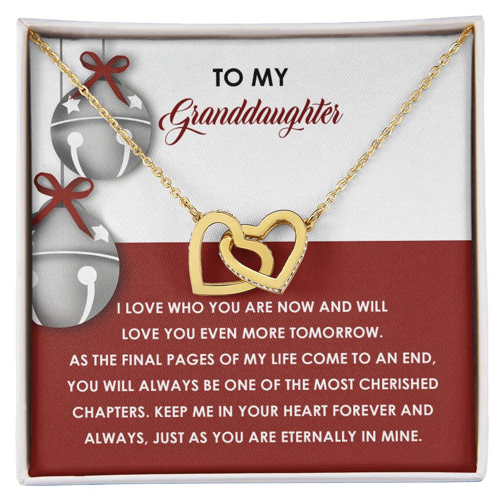 The Granddaughter-To An End - Interlocking Hearts Necklace, embellished with cubic zirconia crystals, showcases a breathtaking gold double-heart design. It is beautifully presented in a box and includes a heartfelt message for your granddaughter.