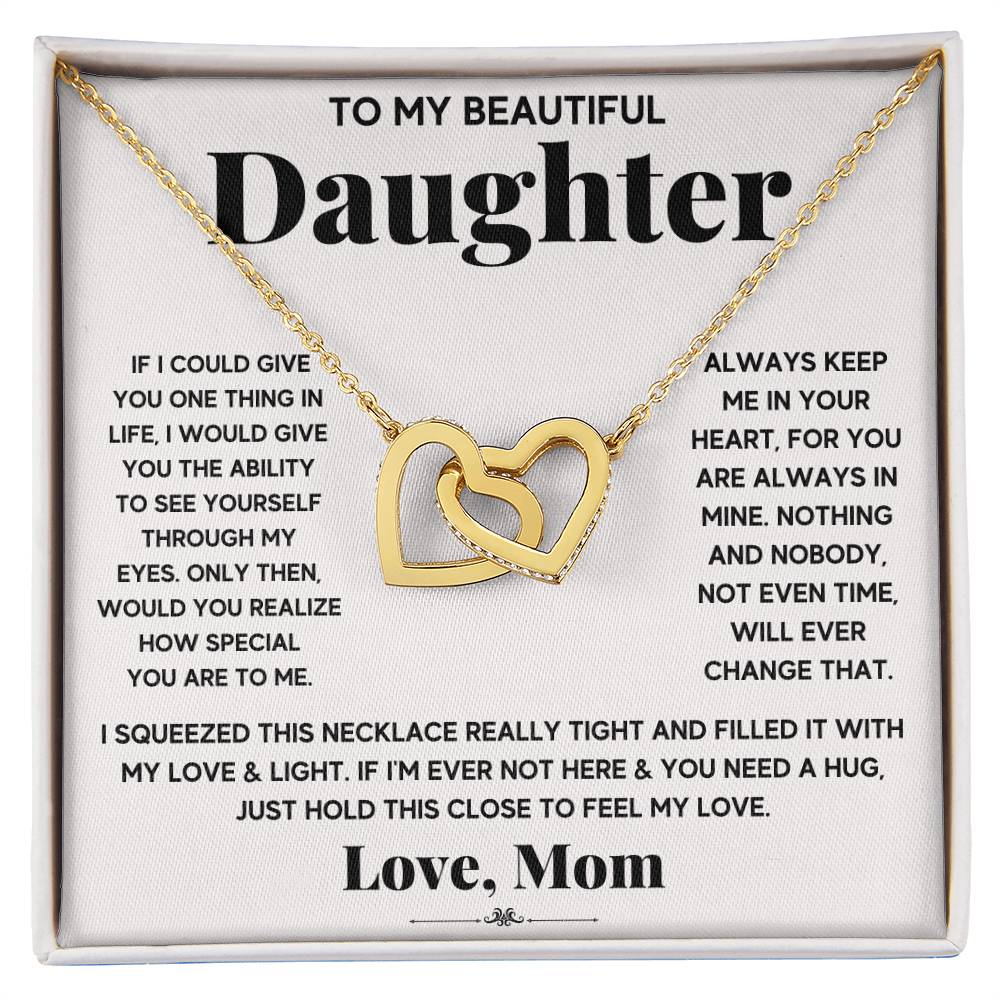 A To My Beautiful Daughter, Just Hold This To Feel My Love - Interlocking Hearts Necklace adorned with cubic zirconia crystals, presented in a box with a sentimental message from ShineOn Fulfillment to a daughter.