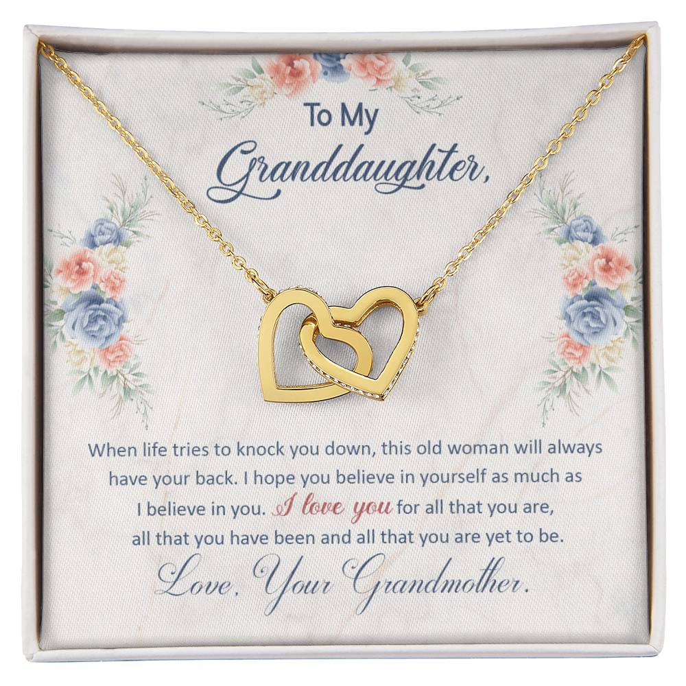 To My Granddaughter, This Old Woman Will Always Have Your Back - Interlocking Hearts Necklace by ShineOn Fulfillment, featuring cubic zirconia crystals and presented in a gift box with floral decoration.