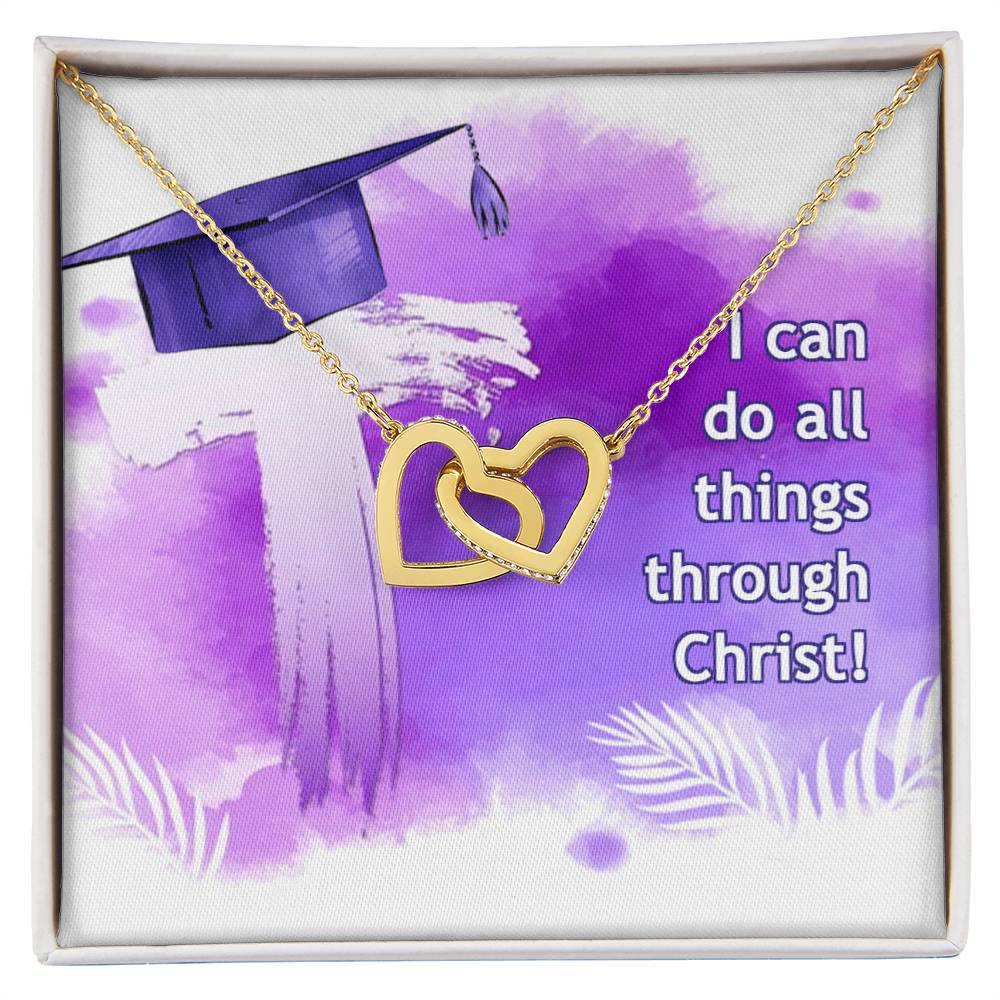 A graduation cap and the I can do all things through Christ - Interlocking Hearts Necklace by ShineOn Fulfillment on a pillow.