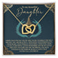 The Daughter-Little Princess Interlocking Hearts Necklace, featuring cubic zirconia and a rose gold finish, comes in a box with the message "To my beautiful daughter" and an inspiring note adorned with a castle and feather design.
