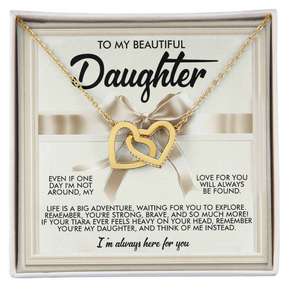 The Daughter-Heavy Tiara necklace in rose gold, featuring interlocking hearts with cubic zirconia crystals, is beautifully presented against a message card adorned with a beige bow, expressing love and support to a daughter.