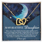 The Daughter-Grown Heart Interlocking Hearts Necklace, enhanced with sparkling cubic zirconia crystals, glistens in its box against a crescent moon and stars backdrop, beautifully highlighting the heartfelt message of enduring love and pride for a daughter.