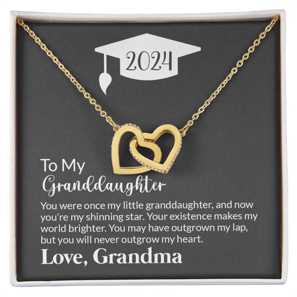 An Interlocking Hearts necklace with cubic zirconia crystals and a message for a granddaughter, celebrating graduation in 2024, presented in a ShineOn Fulfillment gift box.
