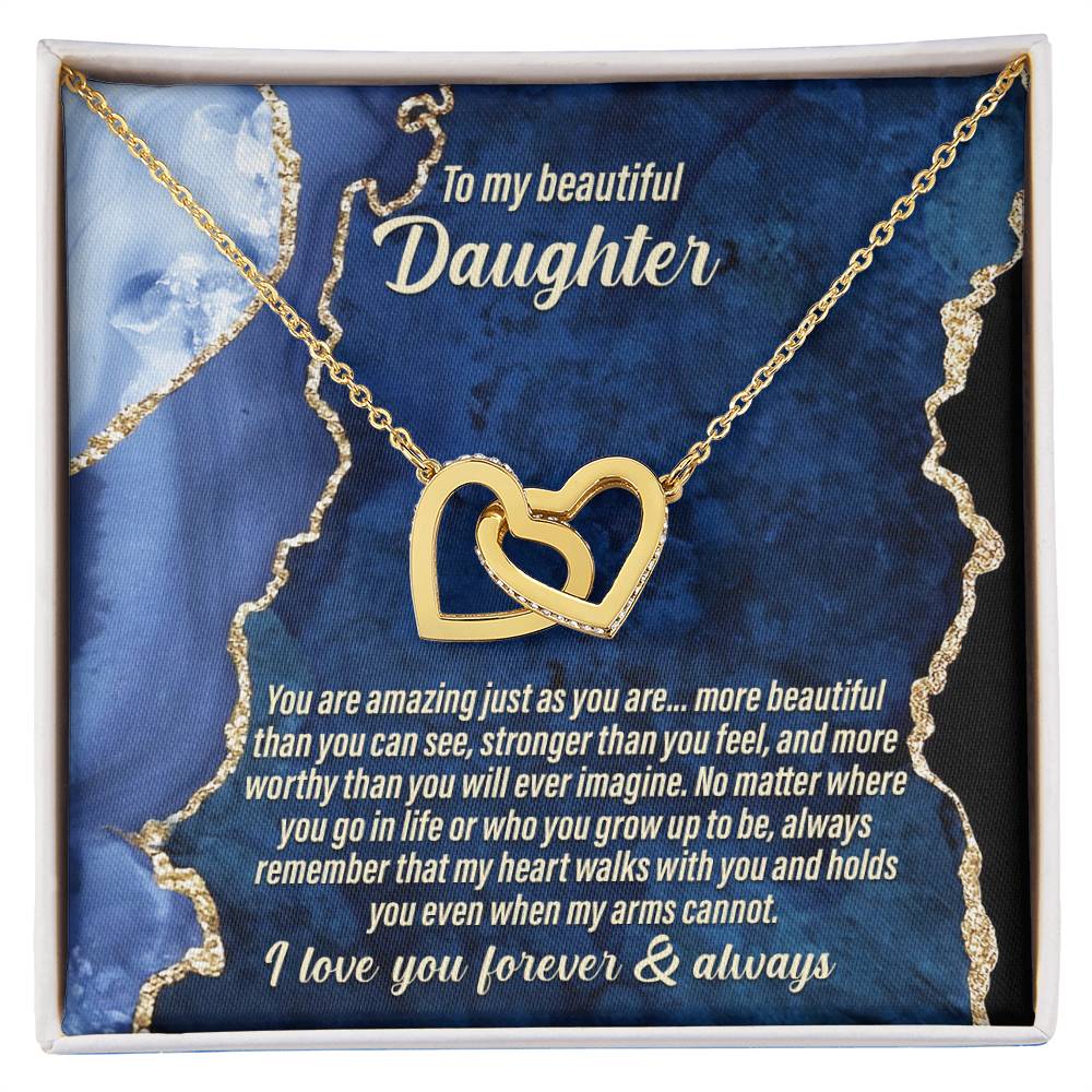 The "To Daughter, As You Are - Interlocking Hearts Necklace" adorned with cubic zirconia crystals comes with a card that says: "To my beautiful daughter. You are amazing just the way you are... I love you forever & always.