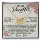 The Daughter-Eternal Home - Interlocking Hearts Necklace features a gold heart with cubic zirconia on a card expressing a father's unwavering love and support. The card's pink and white floral design enhances this touching gift.