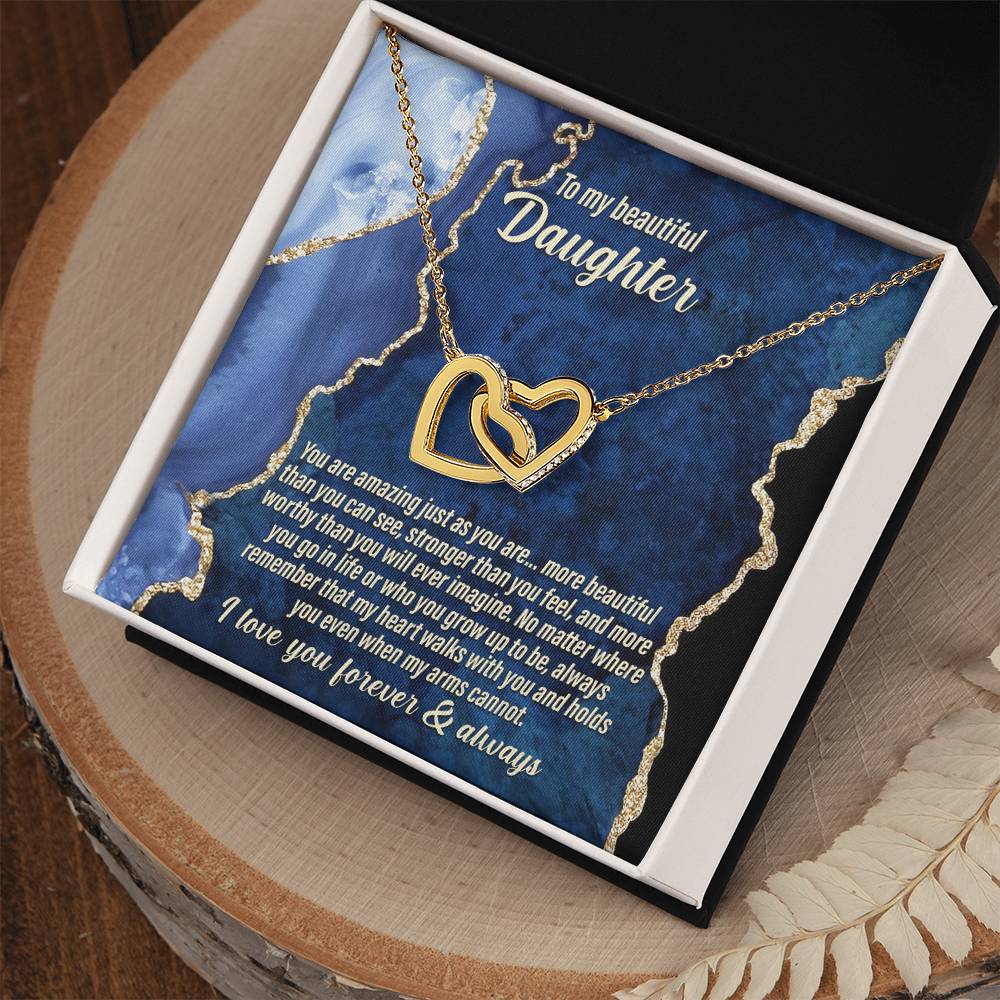 The "To Daughter, As You Are - Interlocking Hearts Necklace" adorned with cubic zirconia crystals comes with a card that says: "To my beautiful daughter. You are amazing just the way you are... I love you forever & always.