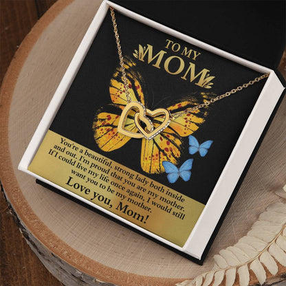 Gift your mom the "[Almost Sold Out] To Mom, Strong Lady - Interlocking Hearts Necklace," with sparkling cubic zirconia, in an open gift box. It features a card with a butterfly design and heartfelt message—an unforgettable token of love.