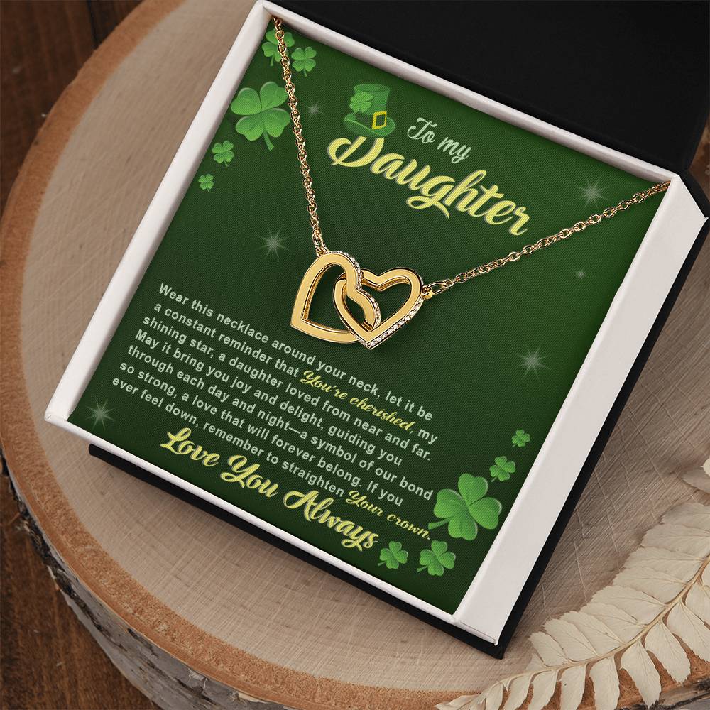 A To My Daughter-Near And Far - Interlocking Hearts Necklace, adorned with shamrocks and cubic zirconia, symbolizes love by ShineOn Fulfillment.