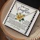 The Daughter-Little Dreamer Interlocking Hearts Necklace, featuring sparkling cubic zirconia in a gold finish, comes in a gift box with a sentimental note titled "To My Lovely Daughter," celebrating her unique place in the giver's life.